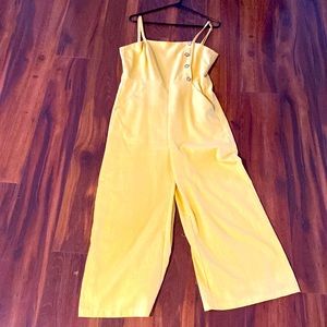 Yellow jumpsuit.